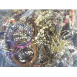 A sealed bag of unsorted pre-owned costume jewellery, approx weight 2.