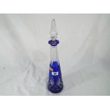 A Bohemian cobalt blue cut to clear glass decanter, approximately 42 cm (h).