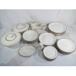 Approximately 60 pieces of Poole dinner service