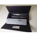 Lamy - a pen and pencil set with spare ink cartridge,