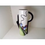 Lorna Bailey - a tall cylindrical jug decorated in the Deco House pattern, signed to the base,