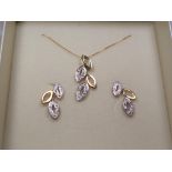 A 9 carat gold 20 pt diamond set leaf earrings and necklet set, approx 4.