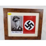A framed photograph depicting a German s