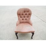 A upholstered occasional chair