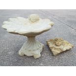 Garden Stoneware - a reconstituted bird bath and a wall plaque in the form of a cherub