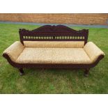 An Indian carved teakwood framed sofa diwan chair,
