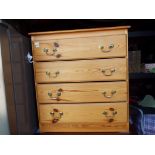 A pine chest of four drawers,
