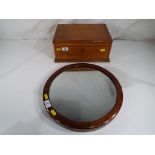 An oak sewing box and a Victorian mahogany circular wall mirror.