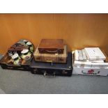 A good mixed lot to include three vintage suitcases, a leather satchel,