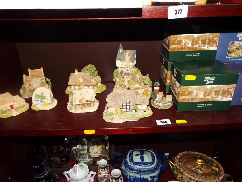 A collection of 14 Lilliput Lane partial boxed.