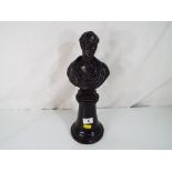 A spelter bust on an ebonised wooden base Est £40 - £60