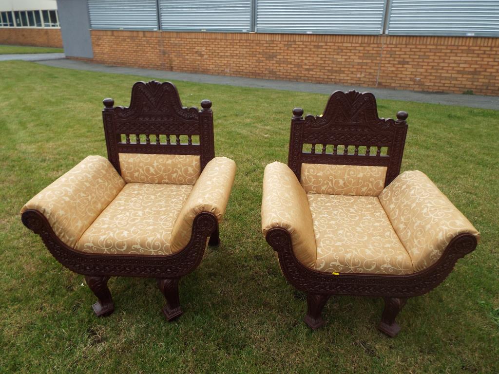 A matched pair of Indian carved teakwood armchairs with upholstery - [2]