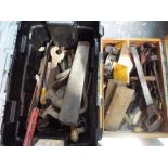 A wooden box containing a quantity vintage hand tools and a further plastic moulded toolbox