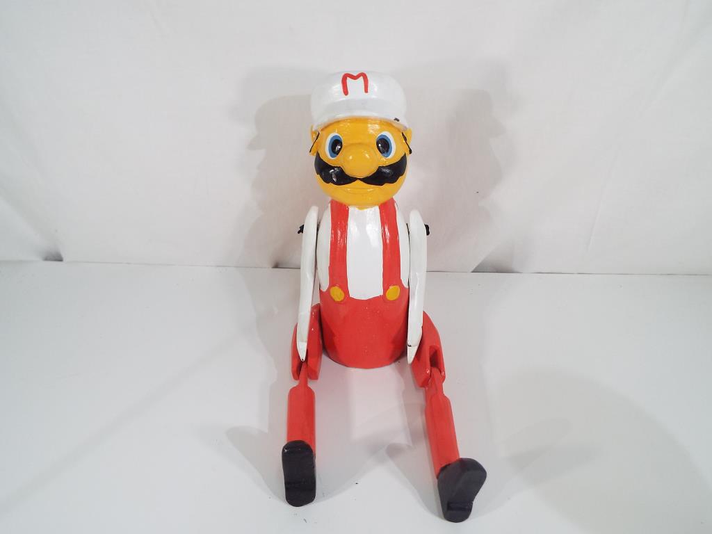 A good quality carved wooden hand-painted shelf puppet depicting Mario. - Image 2 of 2