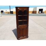 A good quality Old Charm corner display cabinet,