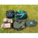 A good lot of four fishing bags to include Badger,