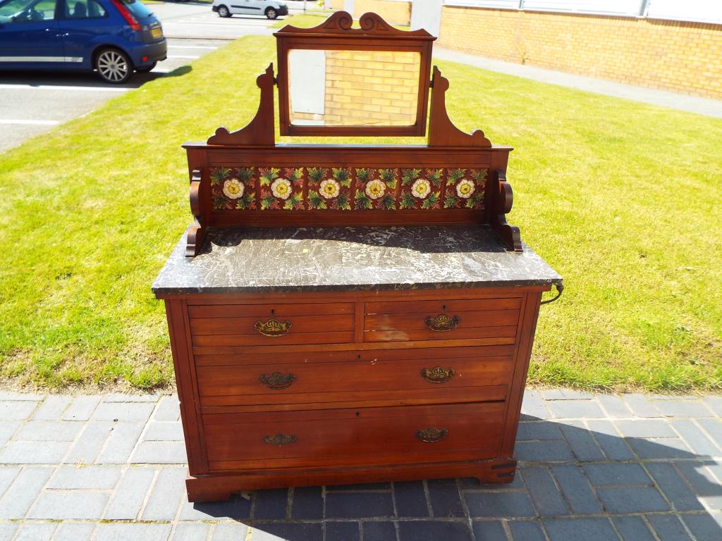 An oak marble topped mirror back washstand by Co-operative Cabinet Makers Ltd,