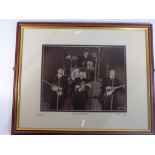 Beatles - Rolling Stones - two framed photographs, mounted and framed under glass, Beatles ca 1963,