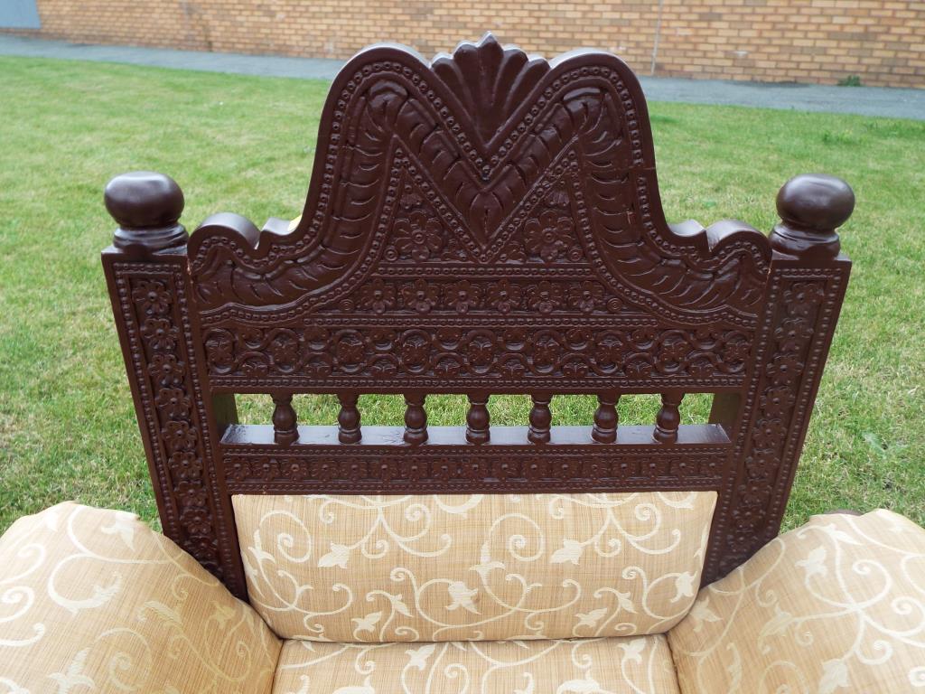 A matched pair of Indian carved teakwood armchairs with upholstery - [2] - Image 2 of 3