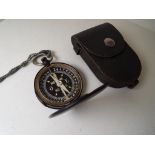 A World War French pocket compass, the brass case with hinged cover,