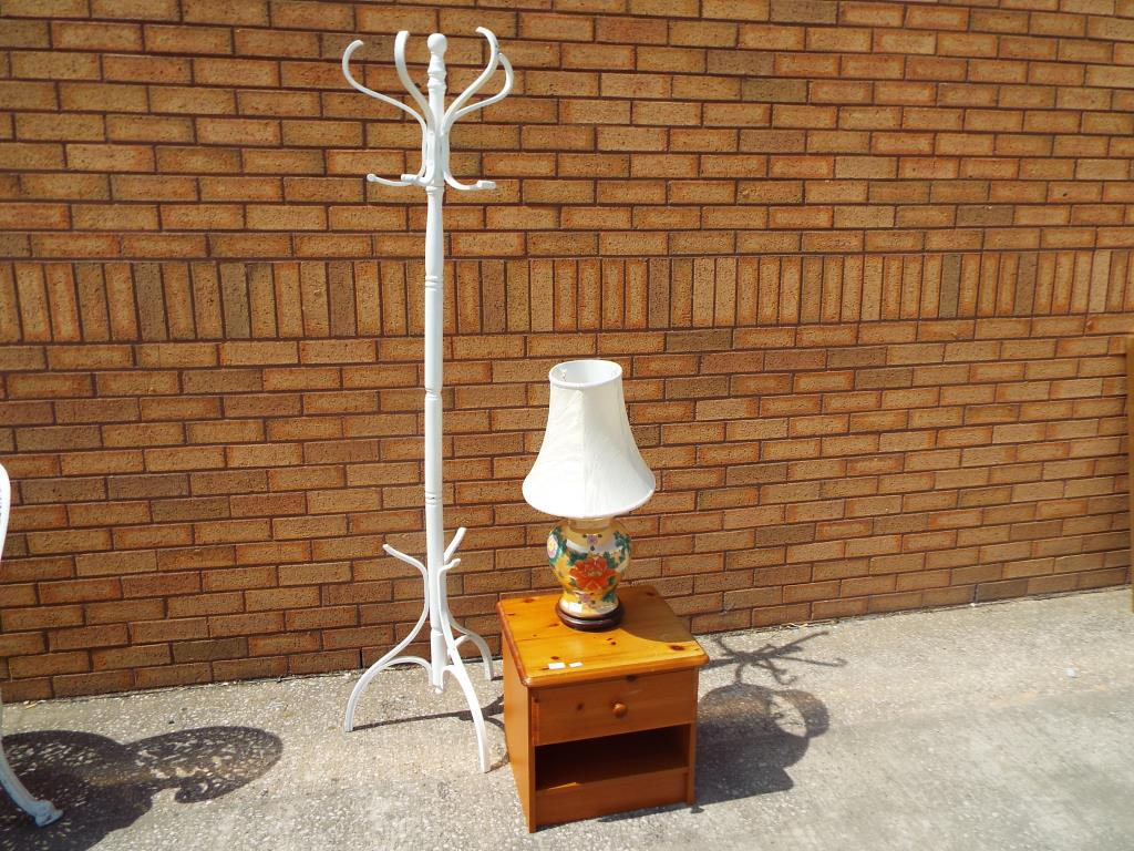 A pine bedside cabinet,