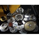 A large collection of plated ware to include table mats, coasters,