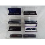 A quantity of vintage Parker pens, predominantly cased,