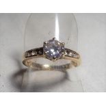 A lady's 9 carat gold stone set with cz ring size P, approximate weight 2.48 grams.