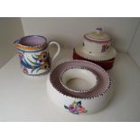 Poole Pottery - three mid 20th C pieces comprising a floral circular trough vase,