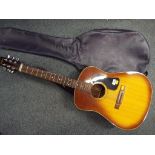 A Washburn acoustic guitar marked to the back of the neck No. 004054 with case.