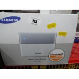 A Samsung digital photo-printer SPP - 220 with Bluetooth connection included