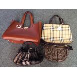A collection of four handbags to include a good quality leather Radley handbag fully marked with