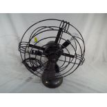 A lamp in the form of a fan Est £35 - £55