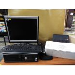 A home PC by Dell with keyboard and mouse, also includes an HP deskjet 1512 printer.