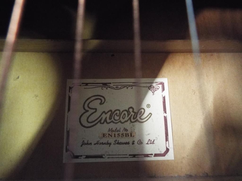 An acoustic guitar by Encore in blue model No. - Bild 2 aus 2