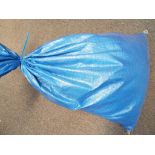 A large sealed sack containing approximately nine bags of unsorted pre-owned costume jewellery,