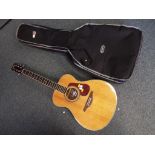 A good quality acoustic guitar by Vintage JHS and Co Ltd model No.