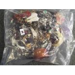 A sealed bag of unsorted pre-owned costume jewellery, approx weight 3.