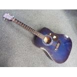 An acoustic guitar by Encore in blue model No.