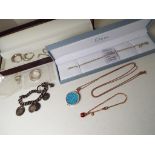 A good mixed lot of lady's and gentleman's jewellery to include a sterling silver bracelet by Dew