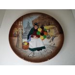 Royal Doulton - a plate depicting The Old Balloon Seller designed by Leslie Harradine D6649, 25.