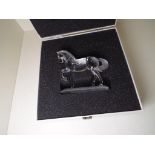 Swarovski Silver Crystal - a figure depicting a trotting horse on frosted glass plinth,