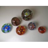 Six modern glass paperweights