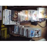 A collection of computer games to include PS3, Nintendo Wii Super Mario Cart,