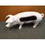 A black and white garden pig approx 55cm (l) Est £20 - £40