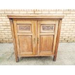 A mahogany Victorian carved front two do