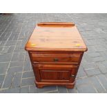 A pine bedside cabinet, 64 cm (h) x 47 c