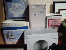 A good lot to include a ceiling spotlight, 2 wall lights, a gym ball and similar, all boxed.