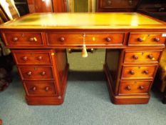 A good quality leather topped pedestal desk approximate height 77 cm x 130 cm x 68 cm