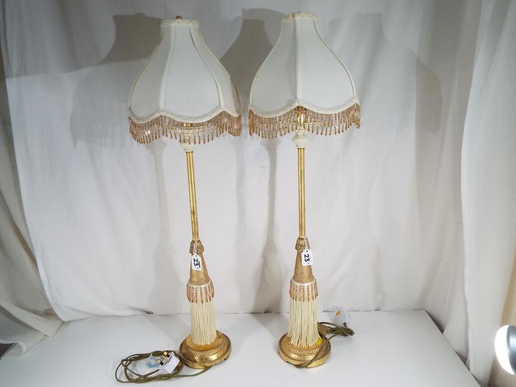 A pair of good quality table lamps,